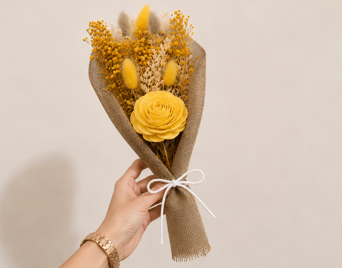 Hand holding the Cherivo Sunlit Meadow dried flower bouquet