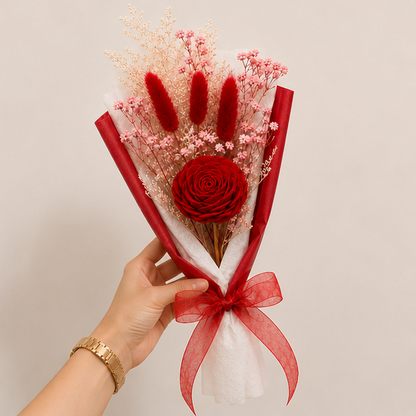 Hand holding the Cherivo Rose Whisper dried flower bouquet