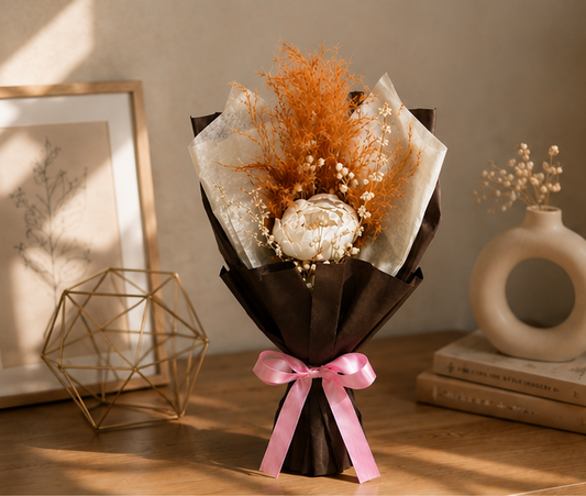 Cherivo Blush Ember dried flower bouquet styled in a room setting